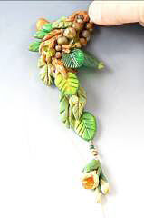 Clay branch with glass leaves